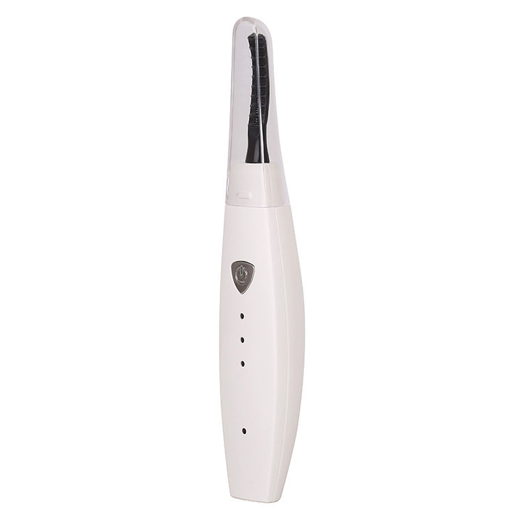 USB rechargeable heated eyelash curler with quick heating for naturally lifted, long-lasting curled lashes.