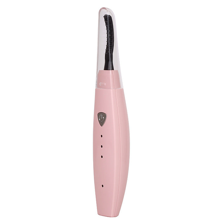 USB rechargeable heated eyelash curler with quick heating for naturally lifted, long-lasting curled lashes.