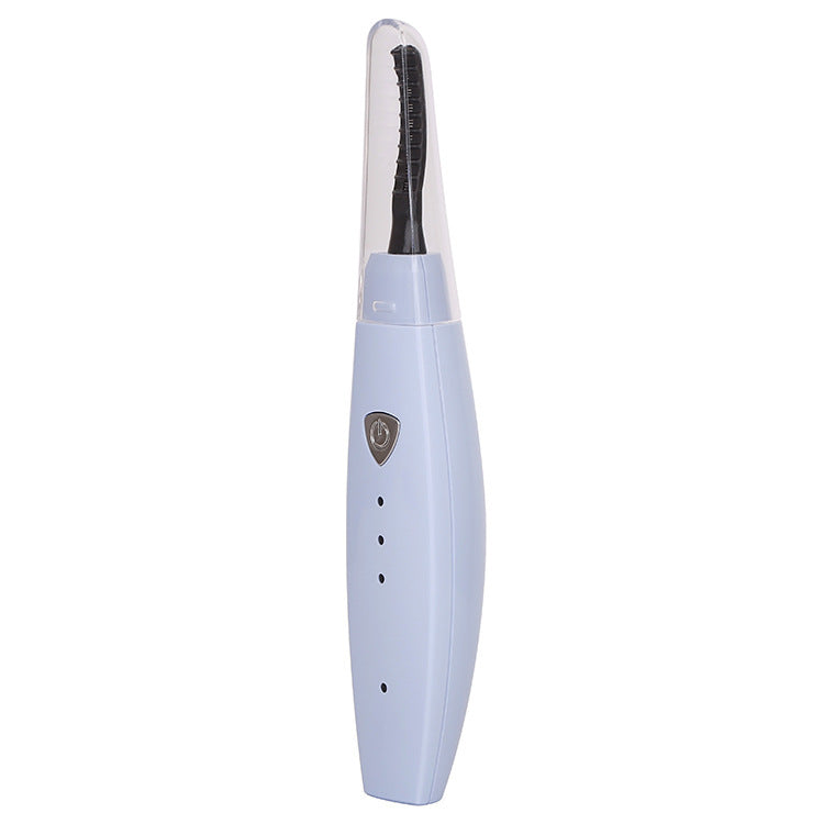 USB rechargeable heated eyelash curler with quick heating for naturally lifted, long-lasting curled lashes.