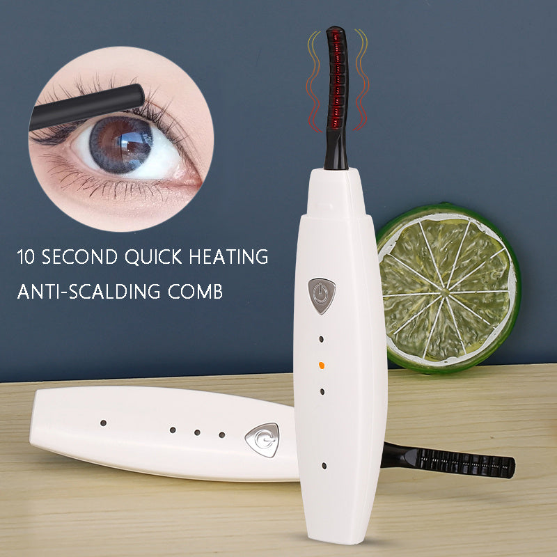 USB rechargeable heated eyelash curler with quick heating for naturally lifted, long-lasting curled lashes.