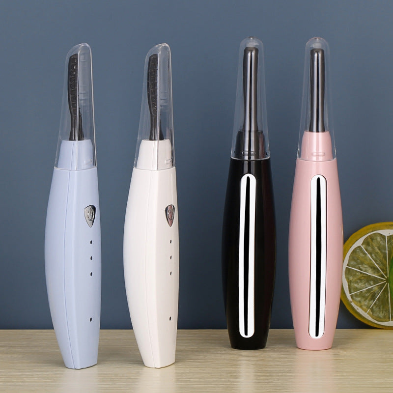 USB rechargeable heated eyelash curler with quick heating for naturally lifted, long-lasting curled lashes.